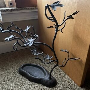 Heavy bronze jewelry tree stand has